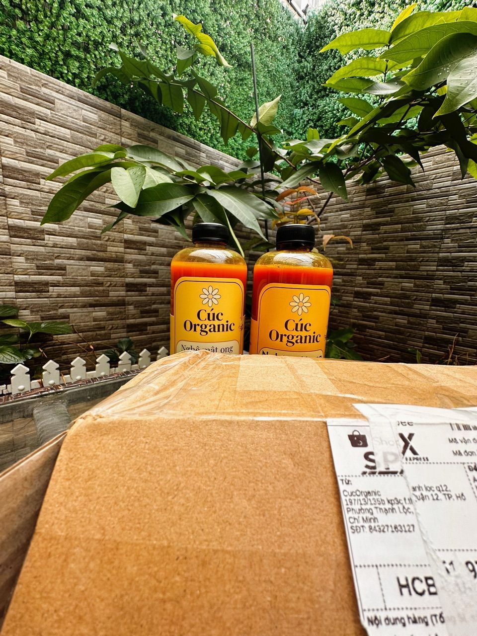 Ảnh khách chụp chai nghệ mật ong lên men sau khi nhận hàng